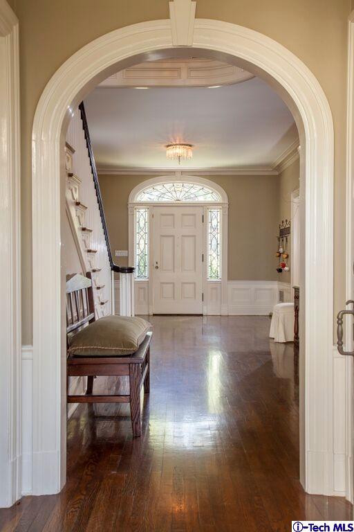 445 Prospect Square Pasadena, CA 91103 - Photo 13 of 45 a view of a livingroom with furniture wooden floor windows and a chandelier