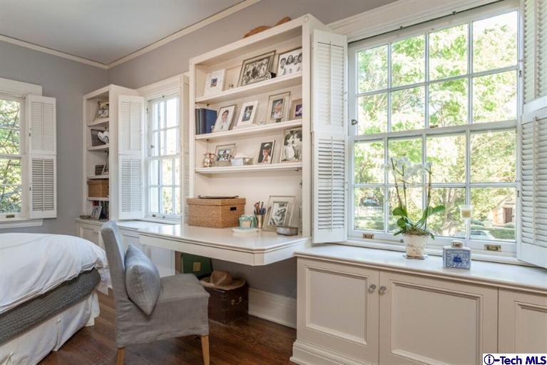 445 Prospect Square Pasadena, CA 91103 - Photo 25 of 45 a workstation with a large window and a chair