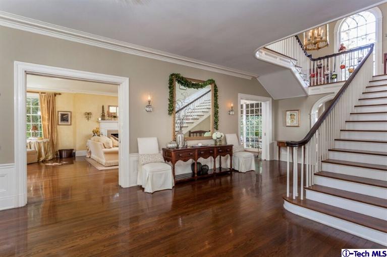 445 Prospect Square Pasadena, CA 91103 - Photo 4 of 45 a living room with fireplace furniture and a wooden floor