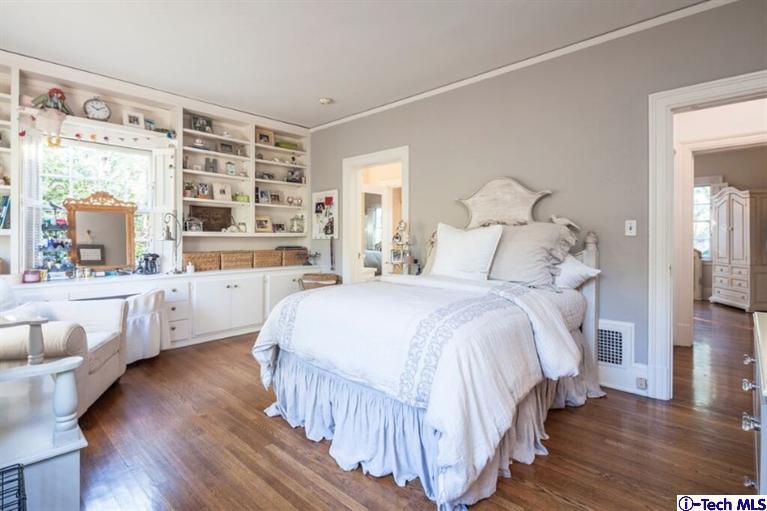 445 Prospect Square Pasadena, CA 91103 - Photo 31 of 45 a bedroom with a large bed and a large window