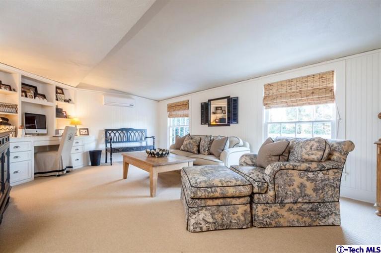 445 Prospect Square Pasadena, CA 91103 - Photo 35 of 45 a living room with furniture large window and flat screen tv