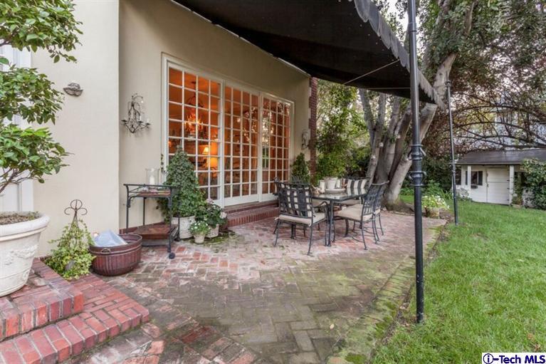 445 Prospect Square Pasadena, CA 91103 - Photo 40 of 45 a view of a patio with a table and chairs