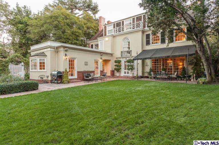 445 Prospect Square Pasadena, CA 91103 - Photo 43 of 45 a front view of a house with a garden and trees