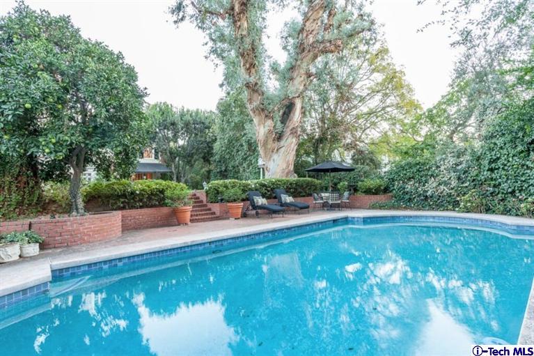 445 Prospect Square Pasadena, CA 91103 - Photo 45 of 45 a view of a swimming pool with a patio