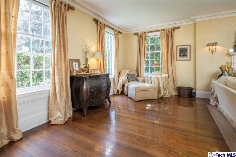 445 Prospect Square Pasadena, CA 91103 - Photo 8 of 45 a living room with furniture and a large window