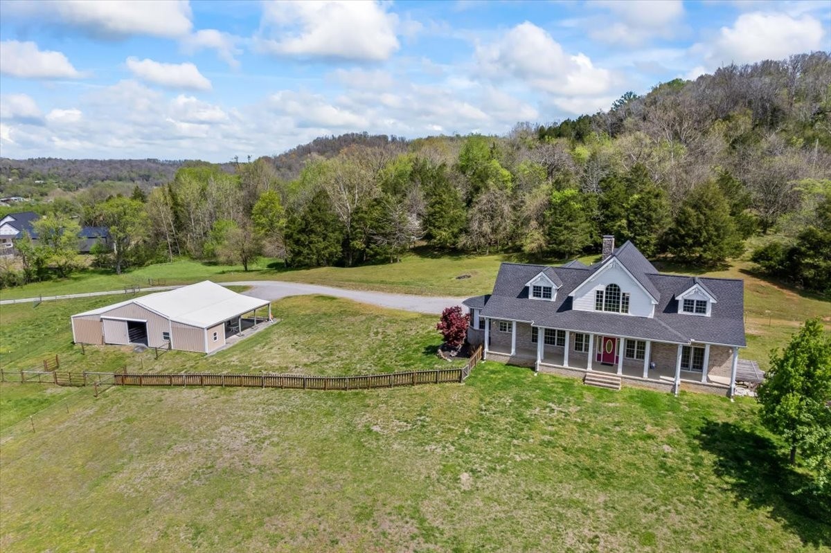 216 Old Wolf Hill Road Bethpage, TN 37022 - Photo 69 of 70 a front view of a house with a yard
