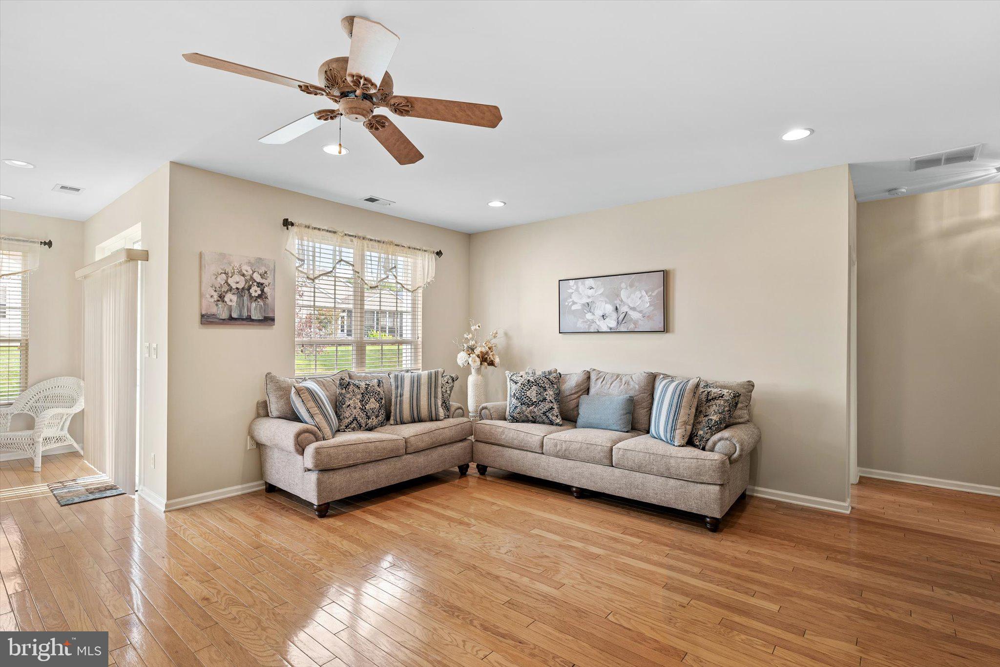 87 Chamber Lane Columbus, NJ 08022 - Photo 13 of 42 a living room with furniture and a large window