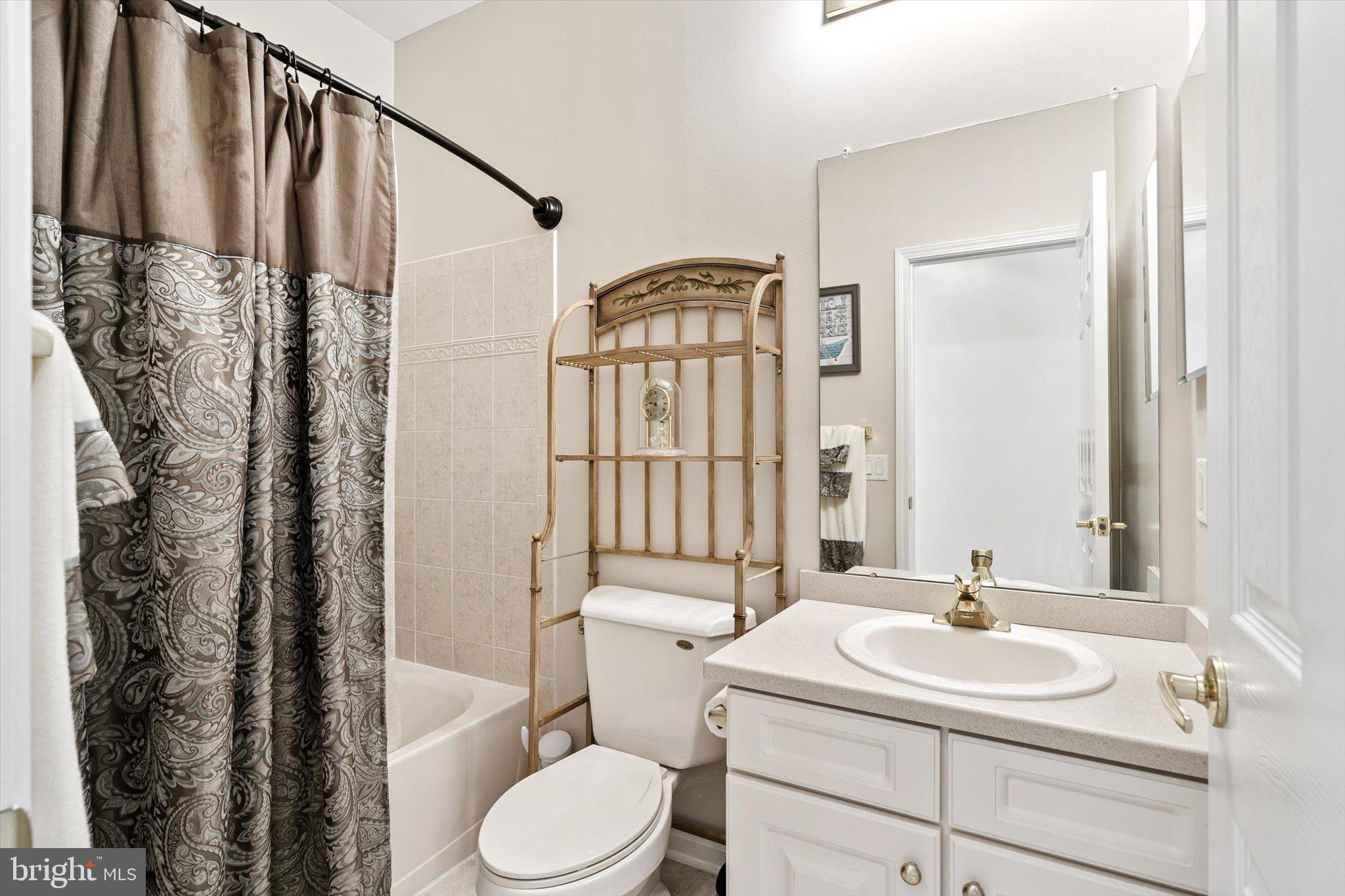 87 Chamber Lane Columbus, NJ 08022 - Photo 19 of 42 a bathroom with a sink toilet and shower