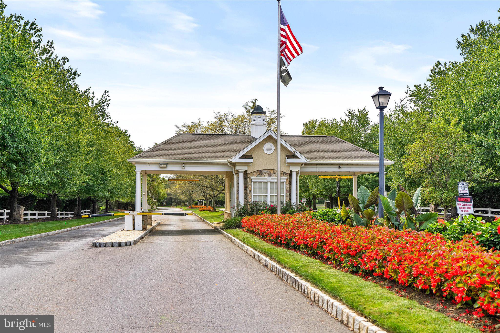 87 Chamber Lane Columbus, NJ 08022 - Photo 41 of 42 a front view of a house with a garden and plants