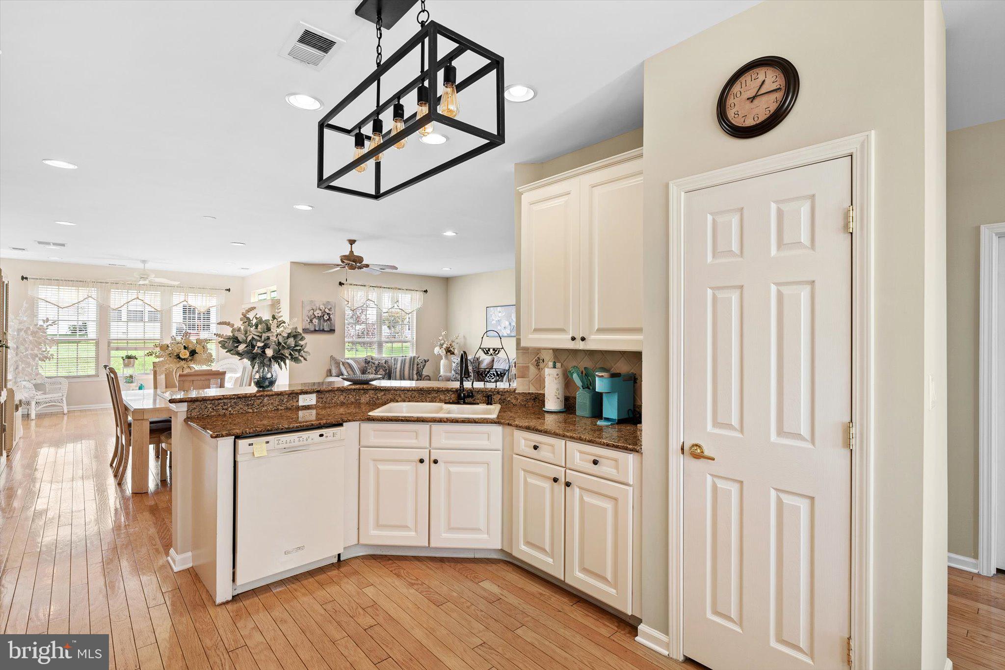 87 Chamber Lane Columbus, NJ 08022 - Photo 8 of 42 a kitchen with stainless steel appliances granite countertop a sink and cabinets