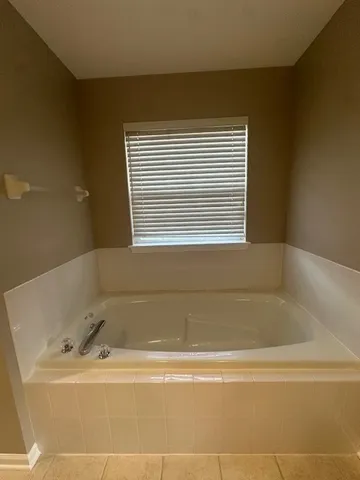 a bathroom with a bathtub