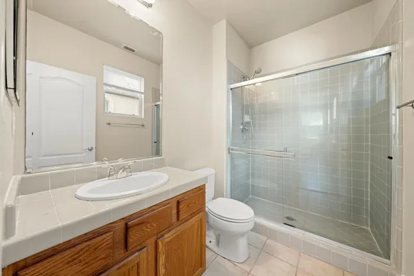 a bathroom with a bathtub and a toilet