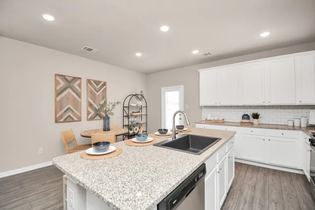 a view of storage and utility room with washer and dryer