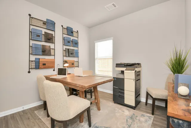 a black and white photo of a living room