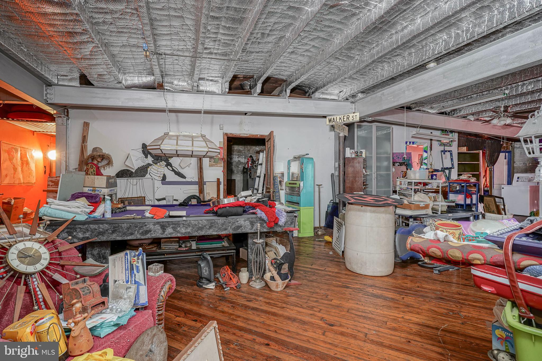 2416 East Sergeant Street Philadelphia, PA 19125 - Photo 11 of 19 a living room filled with lots of furniture