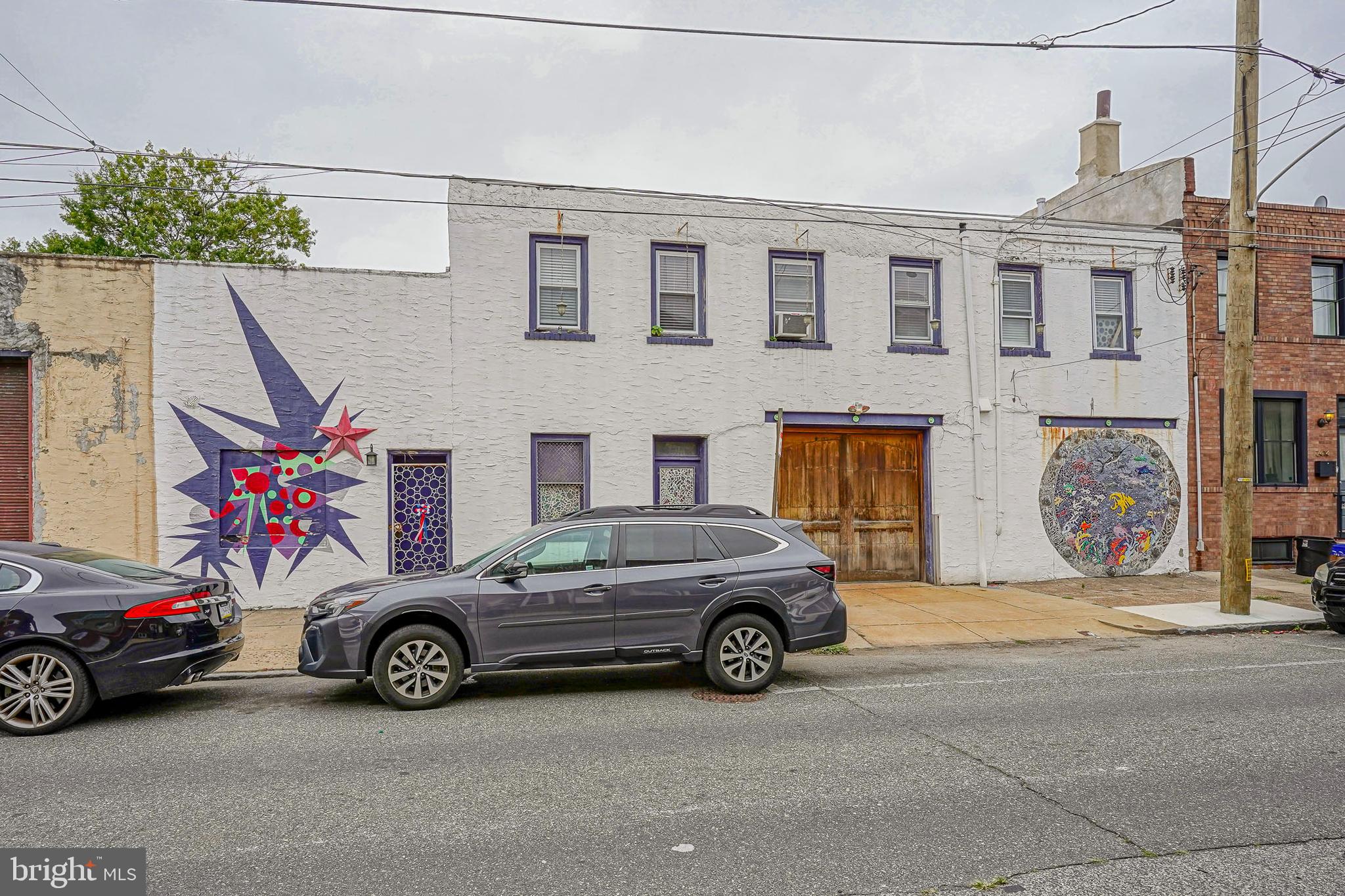 2416 East Sergeant Street Philadelphia, PA 19125 - Photo 3 of 19 a car parked in front of a house
