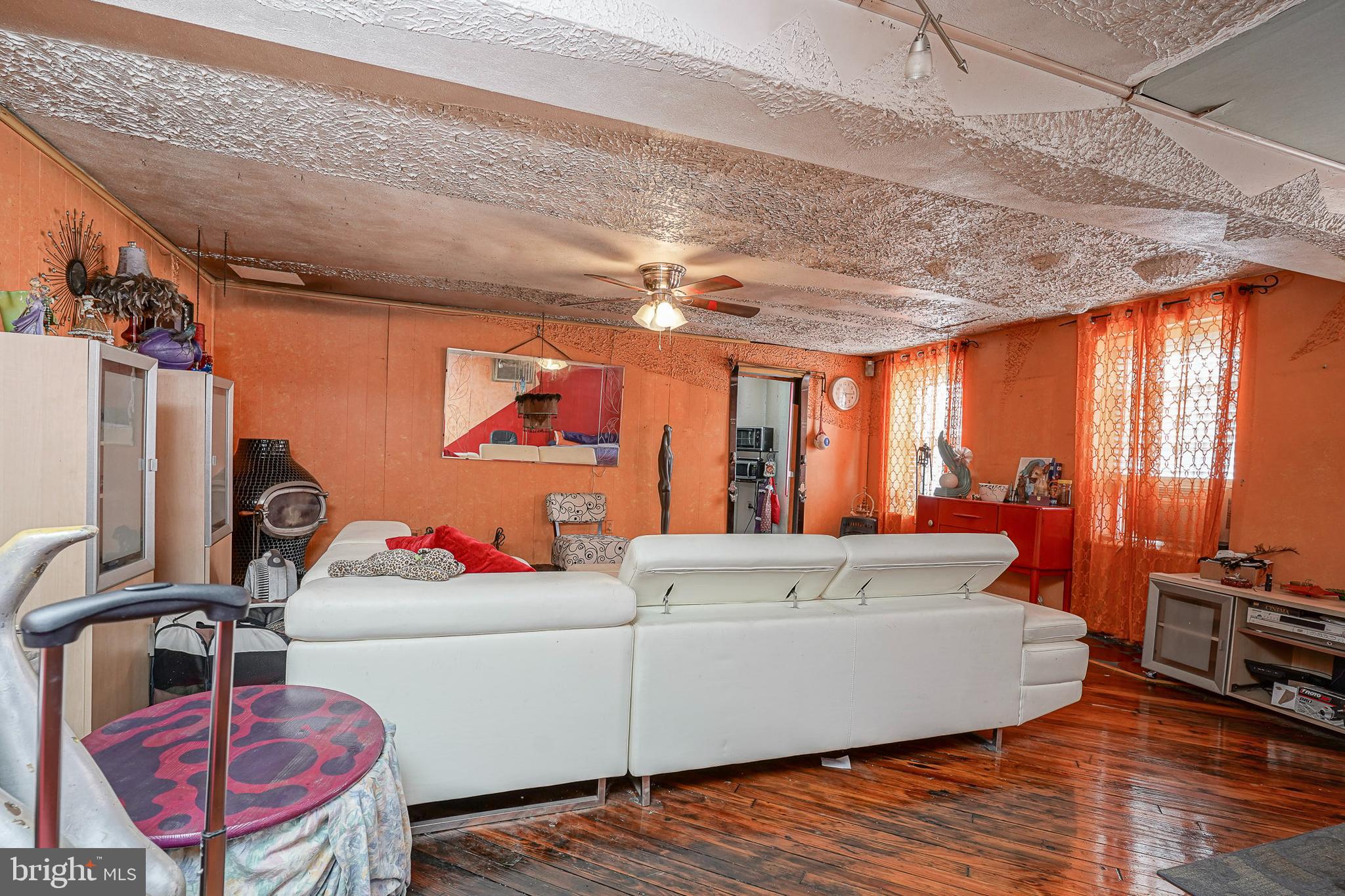 2416 East Sergeant Street Philadelphia, PA 19125 - Photo 5 of 19 a living room with furniture and a window