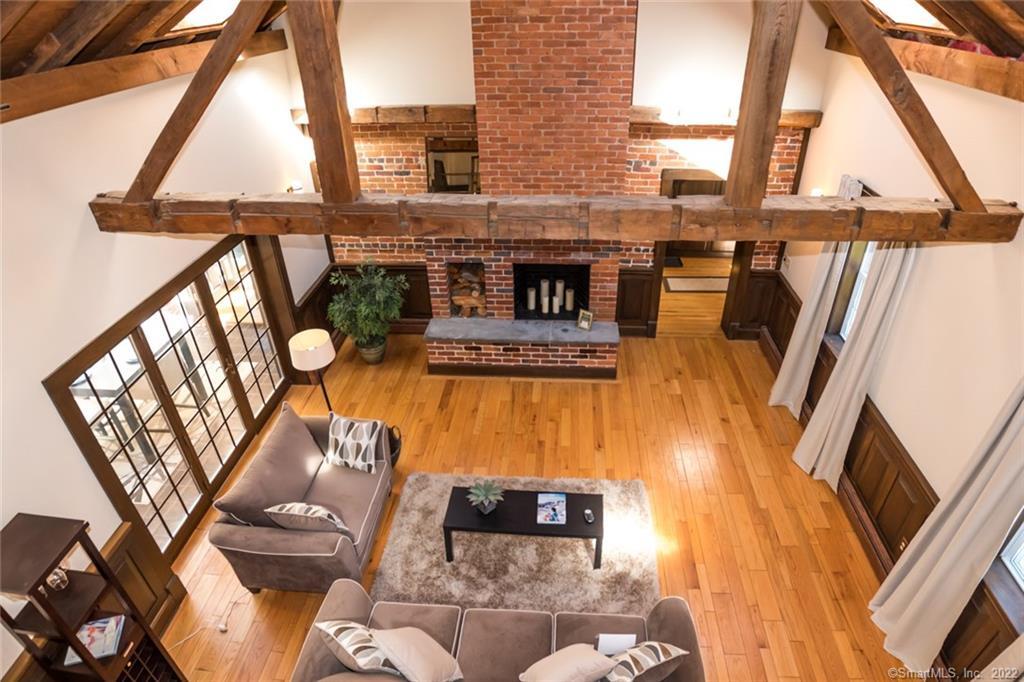 264 Smith Hill Road Colebrook, CT 06021 - Photo 1 of 1 a living room with furniture and a window