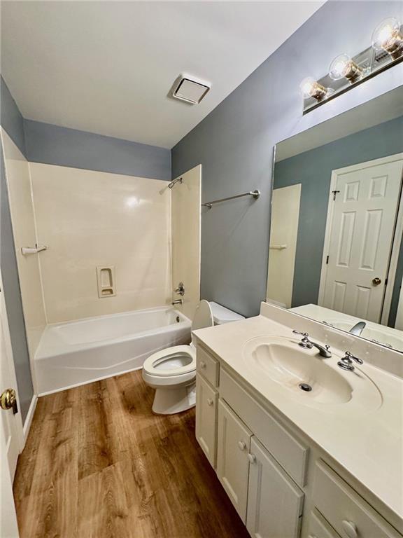 5450 Heathridge Terrace Johns Creek, GA 30097 - Photo 23 of 30 a bathroom with a sink and a mirror