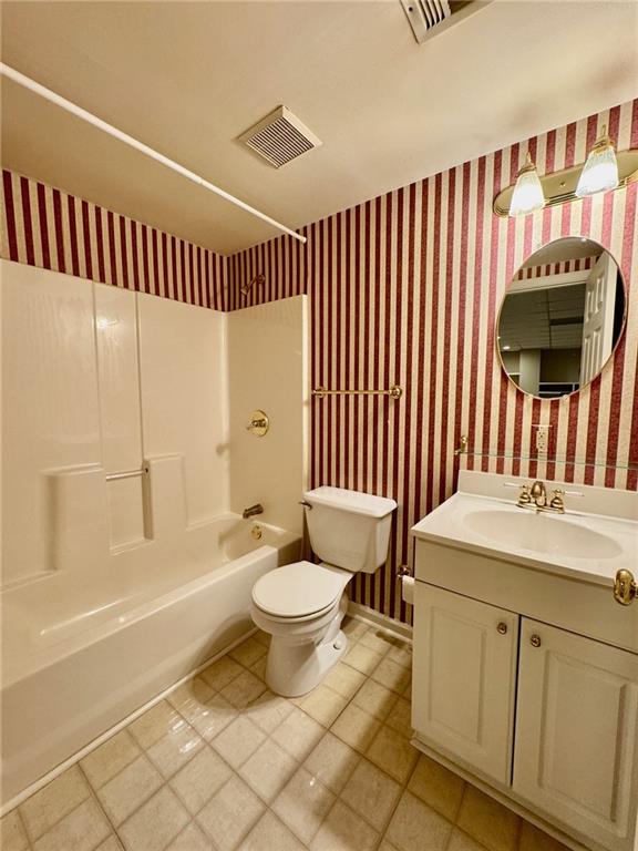 5450 Heathridge Terrace Johns Creek, GA 30097 - Photo 24 of 30 a bathroom with a sink toilet and shower
