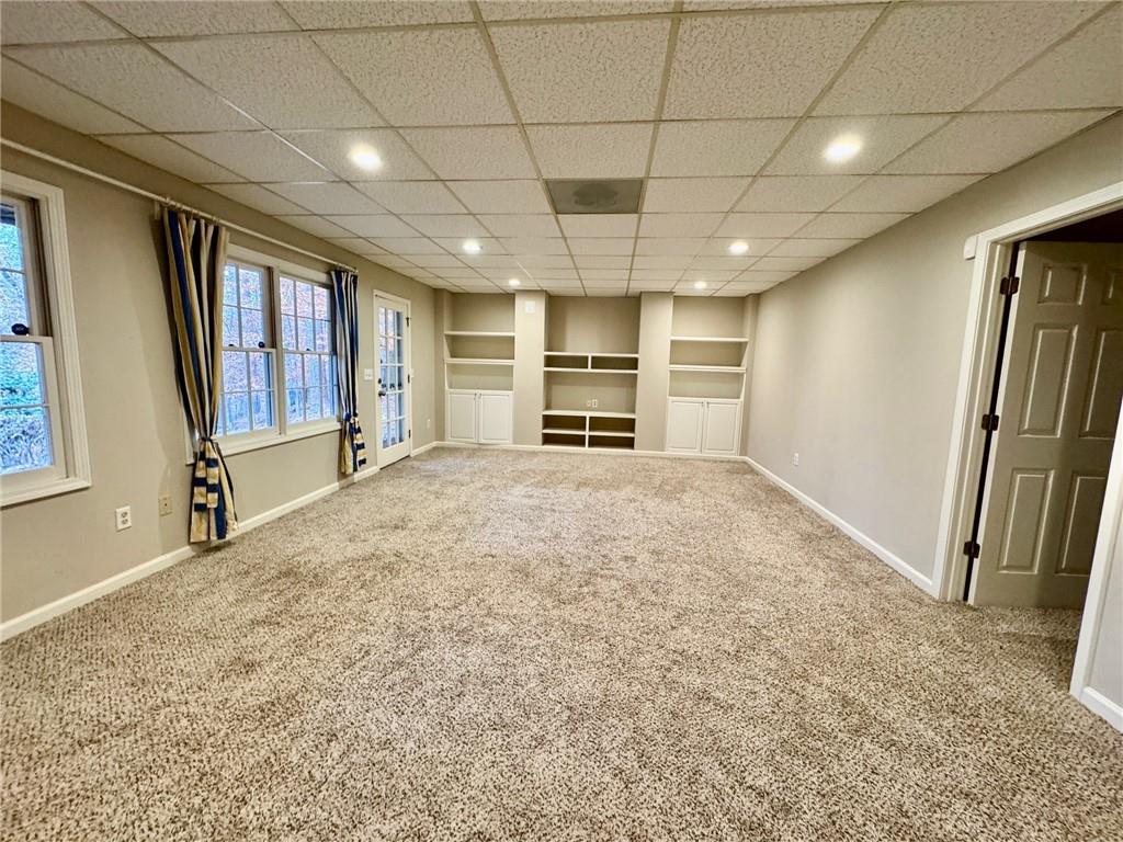 5450 Heathridge Terrace Johns Creek, GA 30097 - Photo 26 of 30 a view of an empty room with a fireplace