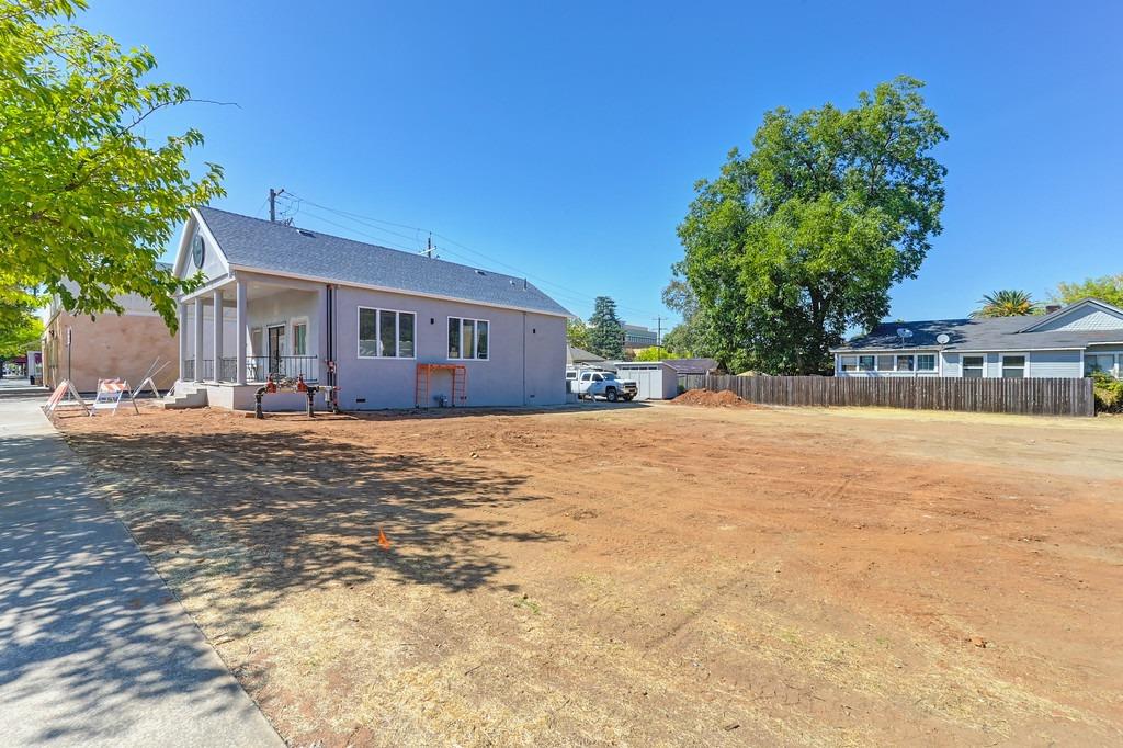 0 5th Street Lincoln, CA 95648 - Photo 20 of 33 a view of house with yard and trees in the background