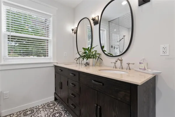 a view of a storage & utility room with two washing machine