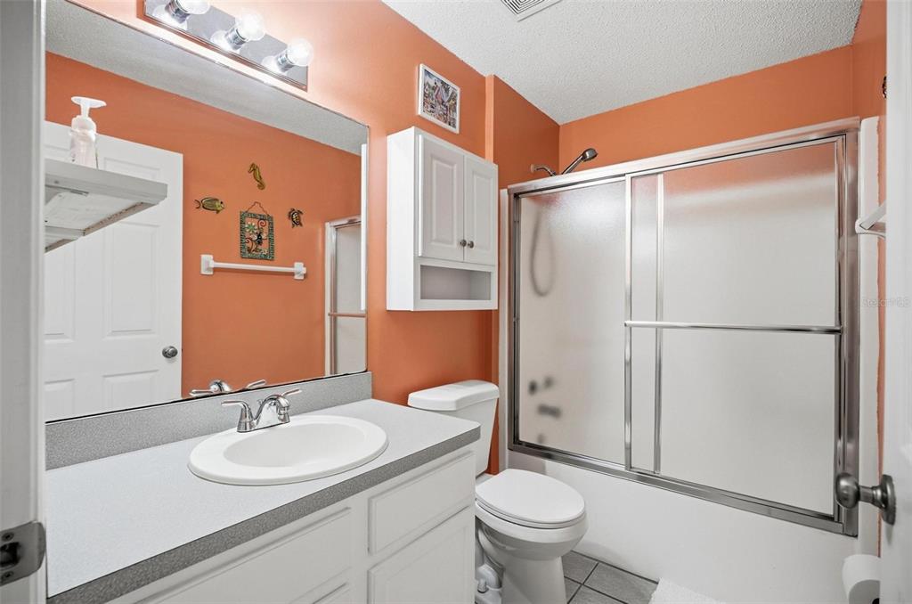 96 Ullian Trail Palm Coast, FL 32164 - Photo 22 of 42 a bathroom with a sink toilet and shower