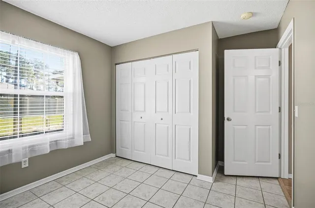 a view of an empty room with window