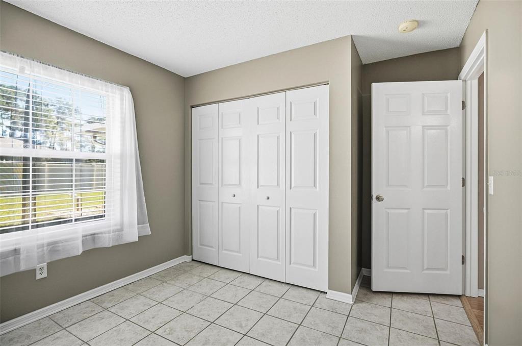 96 Ullian Trail Palm Coast, FL 32164 - Photo 27 of 42 a view of an empty room with window