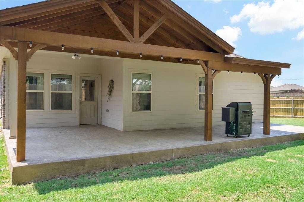 2003 Atlantic Avenue Anna, TX 75409 - Photo 19 of 22 a view of a house with a porch