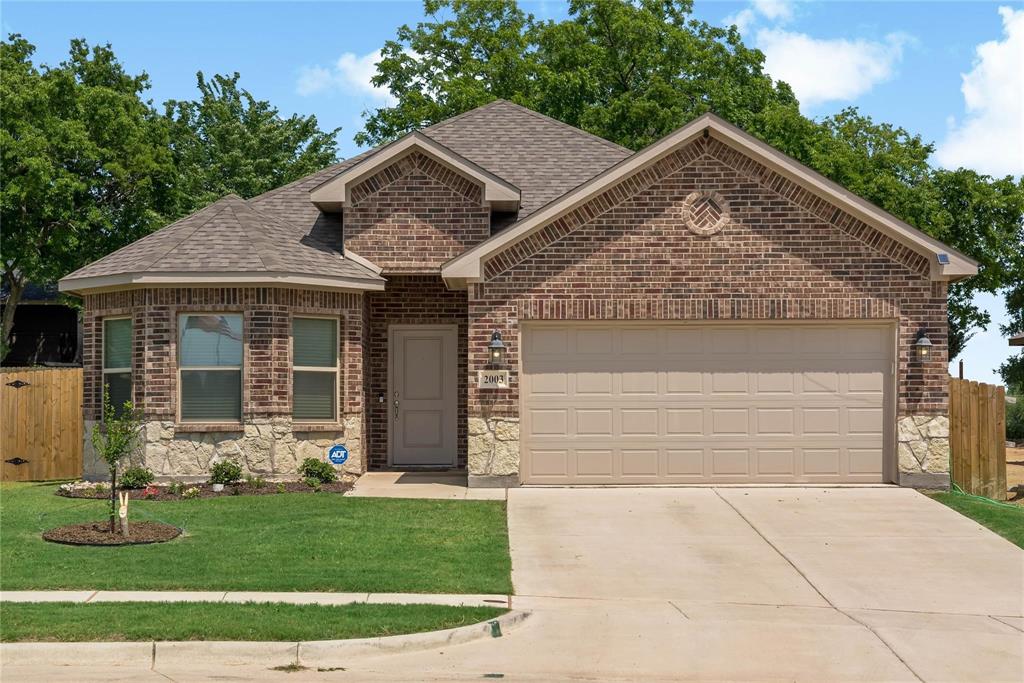 2003 Atlantic Avenue Anna, TX 75409 - Photo 5 of 22 front view of a house with a yard