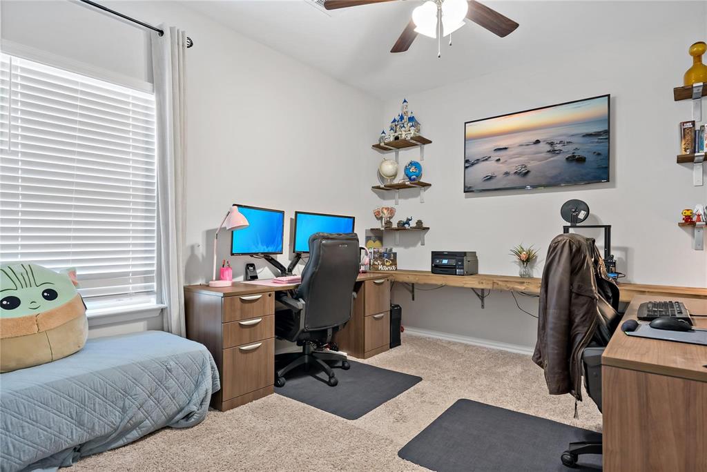 2003 Atlantic Avenue Anna, TX 75409 - Photo 7 of 22 a view of a workspace with furniture and a window