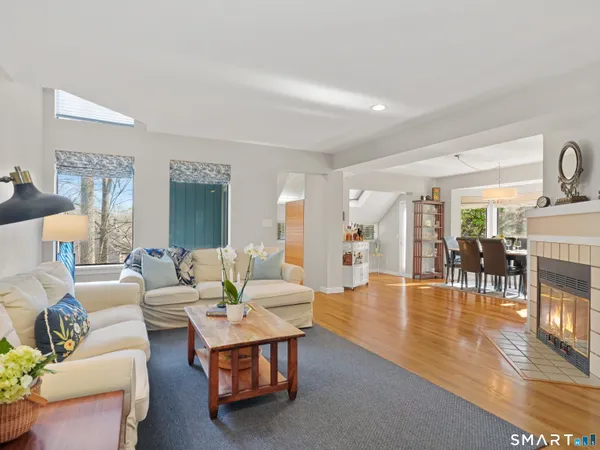 a living room with furniture and a table
