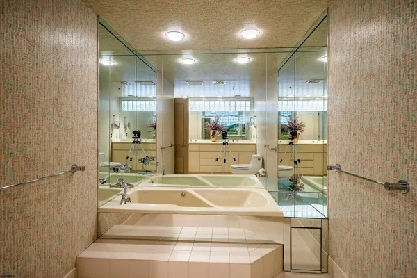 a view of a lobby with black carpet