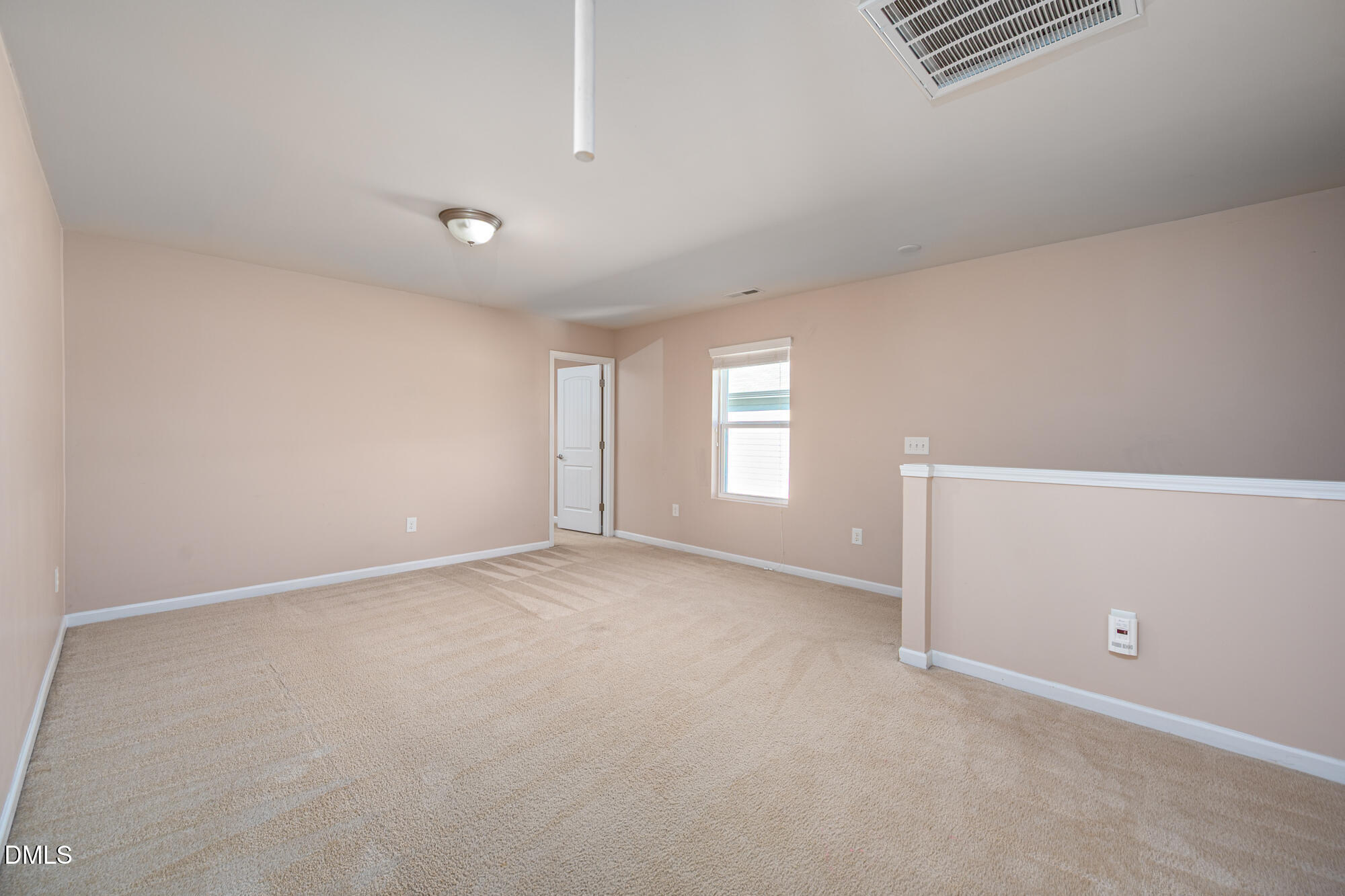 3548 Althorp Drive Raleigh, NC 27616 - Photo 36 of 56 an empty room with windows