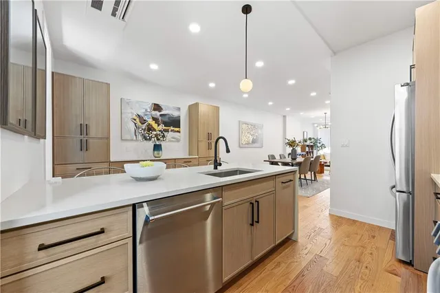 a kitchen with lots of counter space and a sink