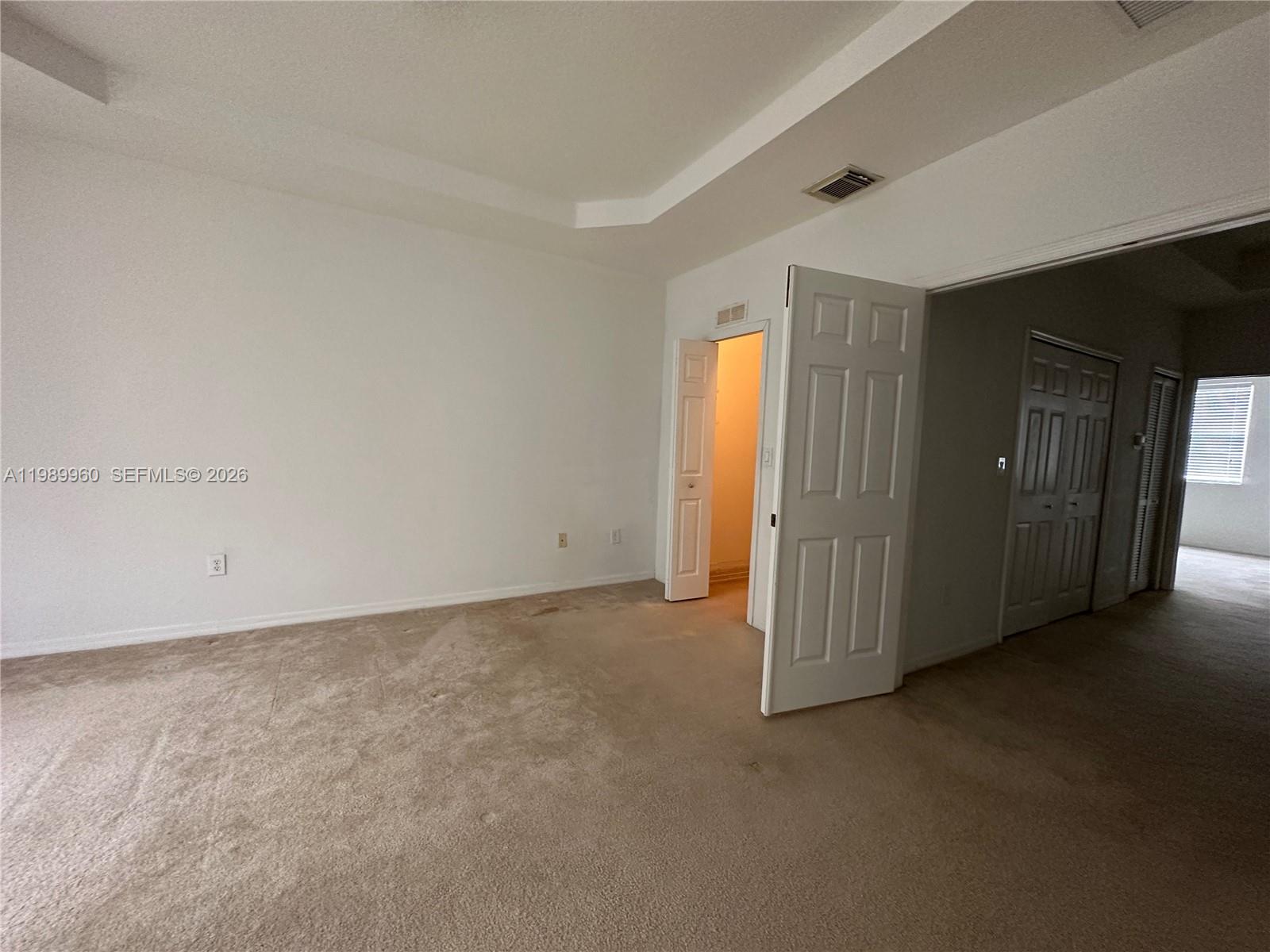 16602 Southwest 78th Terrace Miami, FL 33193 - Photo 9 of 18 an empty room with windows