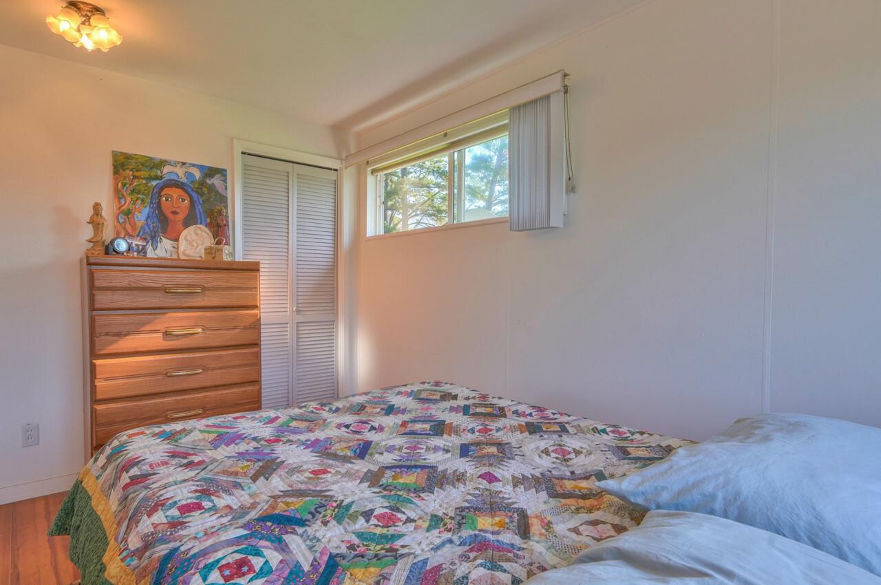 320 Webb Road Watsonville, CA 95076 - Photo 14 of 34 a bedroom with a bed and a window