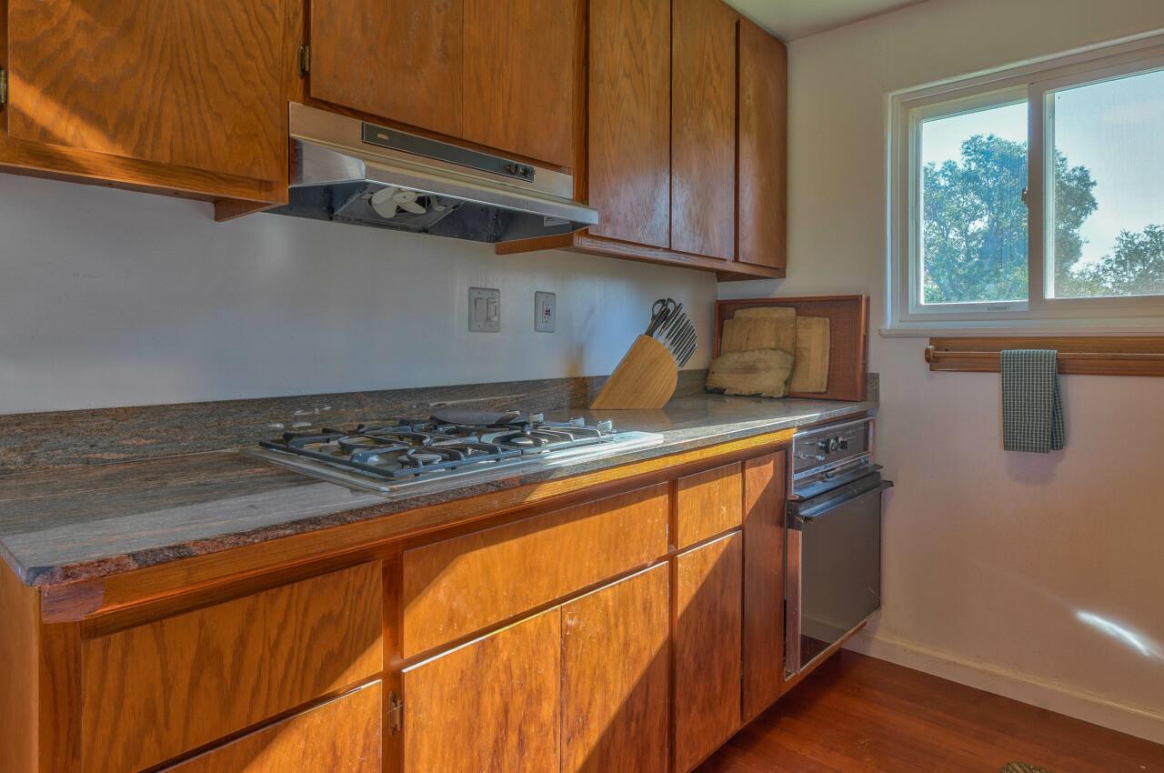 320 Webb Road Watsonville, CA 95076 - Photo 8 of 34 a kitchen with a stove and a microwave