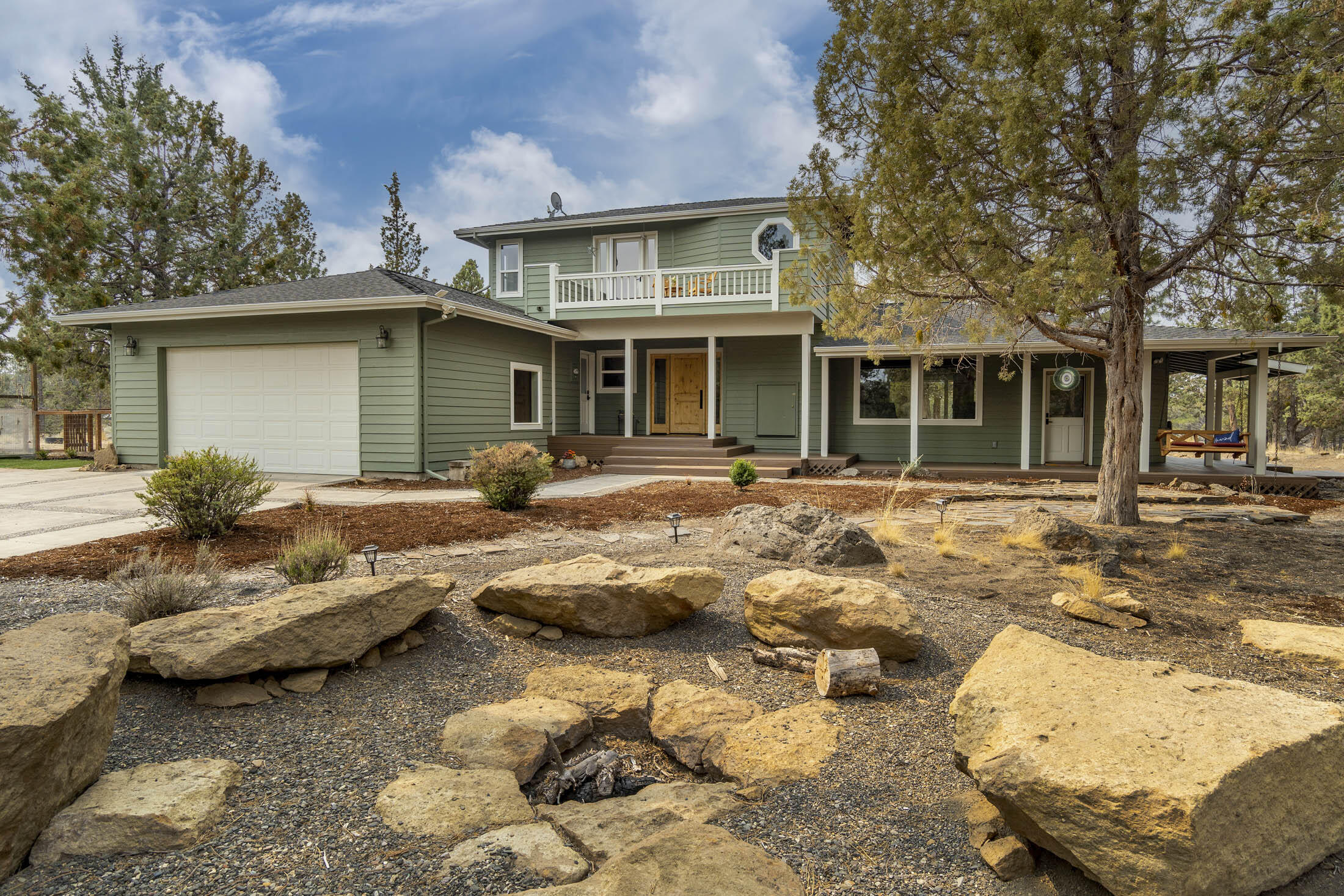 63595 O. B. Riley Road Bend, OR 97703 - Photo 2 of 32 Front of home and fire pit