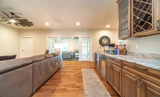 a large kitchen with stainless steel appliances granite countertop lots of counter top space
