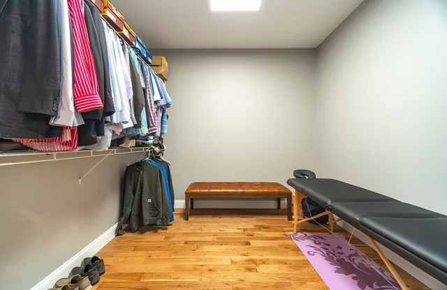 a view of a room with air conditioner and furniture