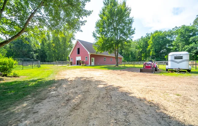 a bathroom with a sink and a large mirror