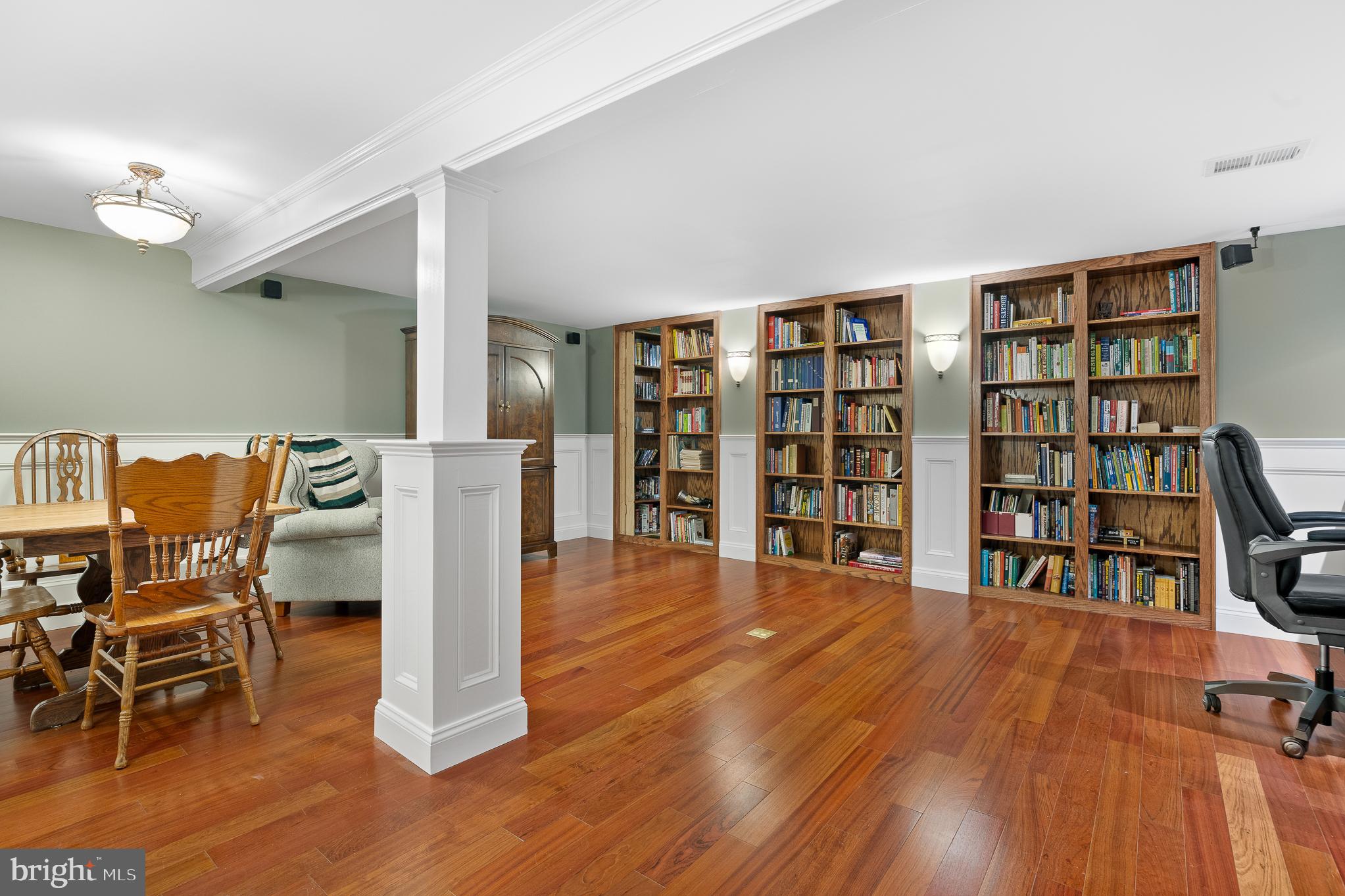 916 Upper Pindell Road Lothian, MD 20711 - Photo 95 of 111 Added Perk-hidden room behind the bookshelves