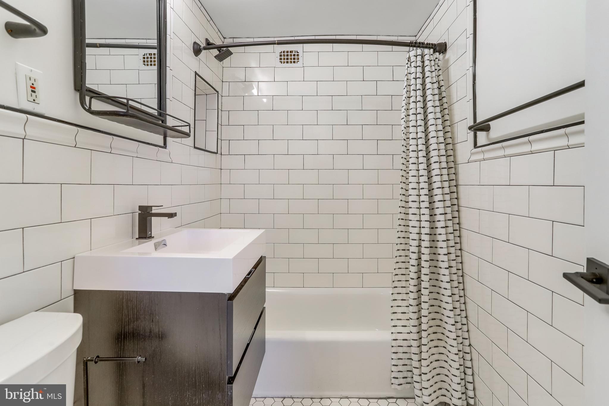 4401 Cherry Hill Road, Unit 46 Arlington, VA 22207 - Photo 17 of 34 Updated bathroom