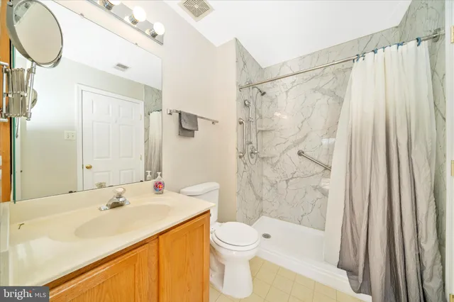 a view of a room with racks on the wall