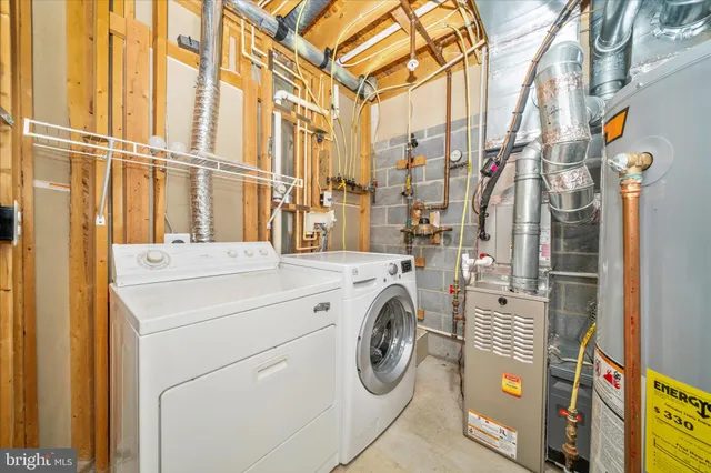 a view of a porch with furniture and a gate