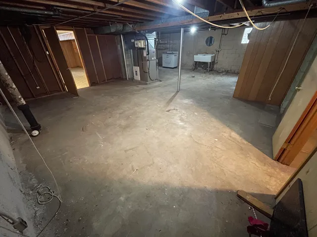 a view of a brick house with a yard