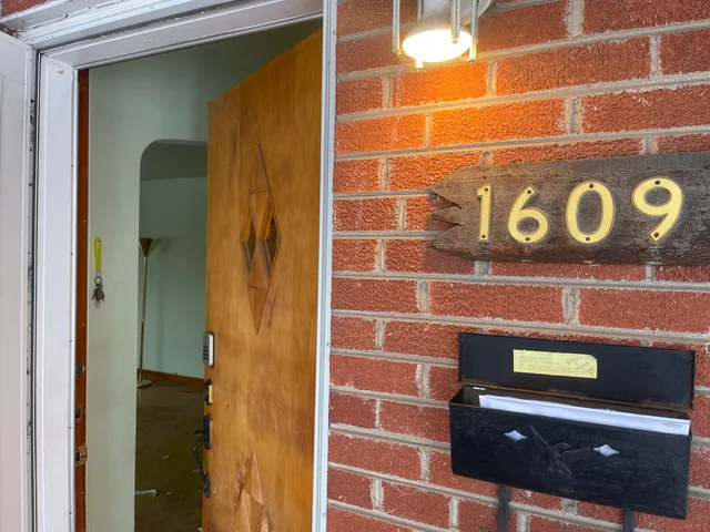 a bathroom with a shower and a sink